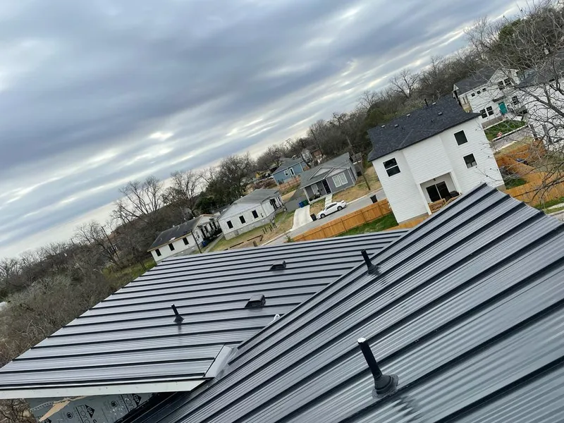Standing seam metal roof panels with vents for Skylight Repair in Goshen